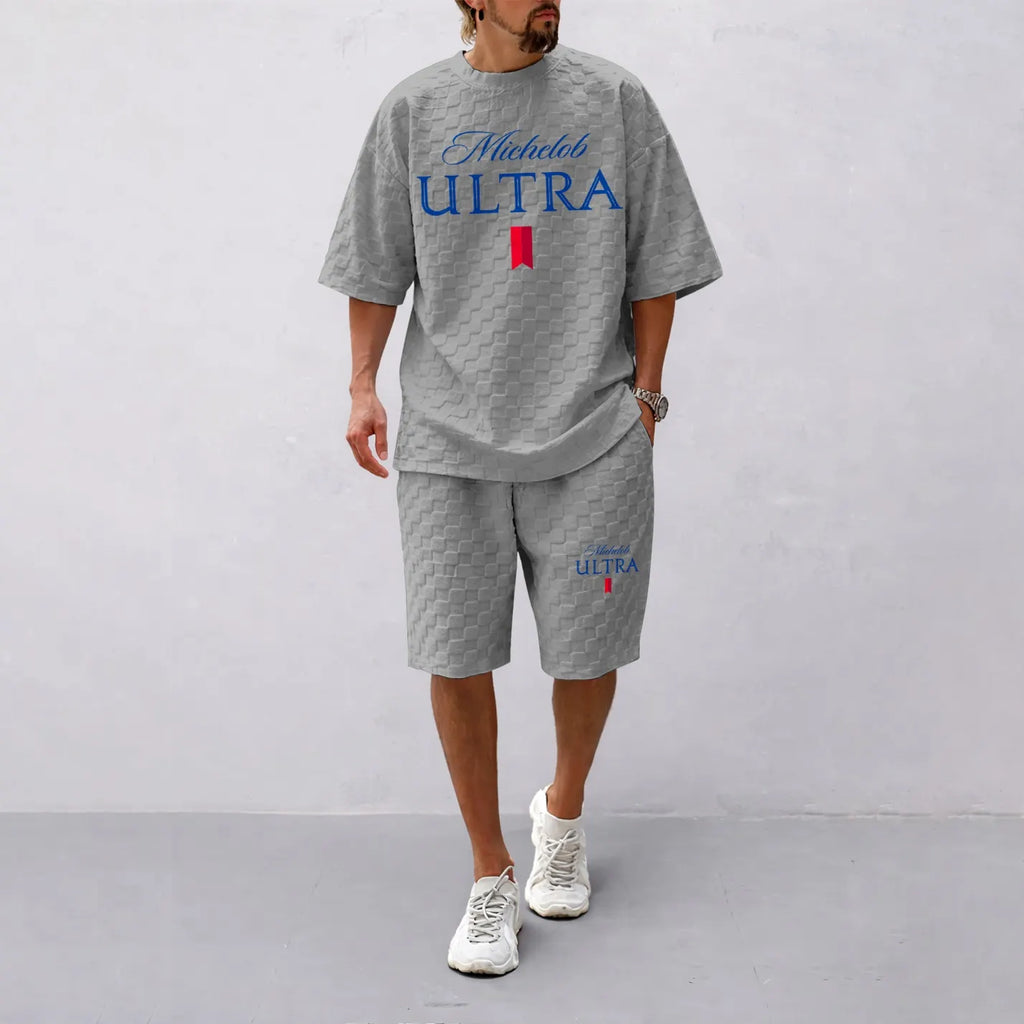 Men's Spring/Summer Drawstring Shorts Set featuring Beverage-Print Plaid Fabric—A casual summer ensemble comprising a short-sleeve shirt and shorts, ideal for both daily wear and athletic activities
