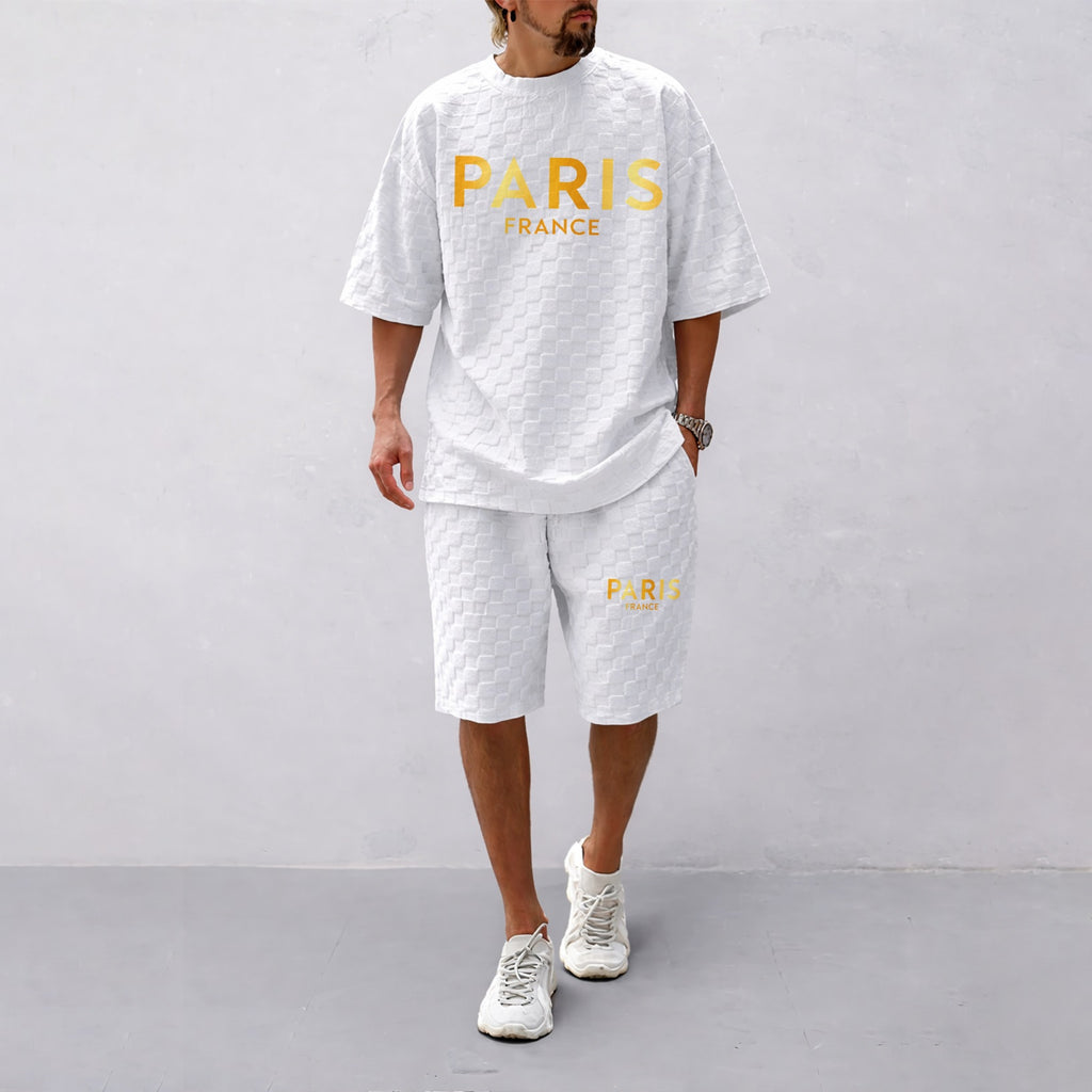 Men's Spring/Summer Drawstring Shorts Set featuring Paris Letter Print and Plaid Fabric—a casual summer ensemble comprising a short-sleeve shirt and shorts, ideal for both everyday wear and athletic activities.
