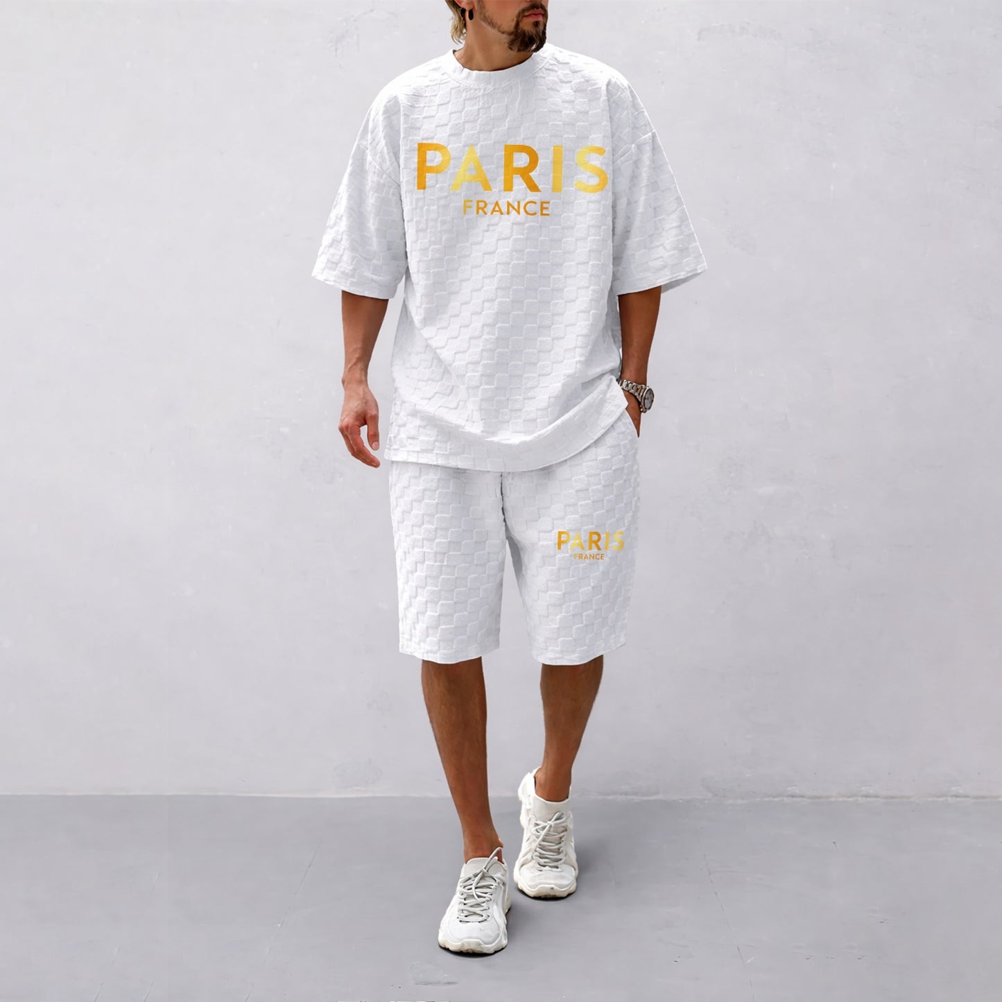 Men's Spring/Summer Drawstring Shorts Set featuring Paris Letter Print and Plaid Fabric—a casual summer ensemble comprising a short-sleeve shirt and shorts, ideal for both everyday wear and athletic activities.