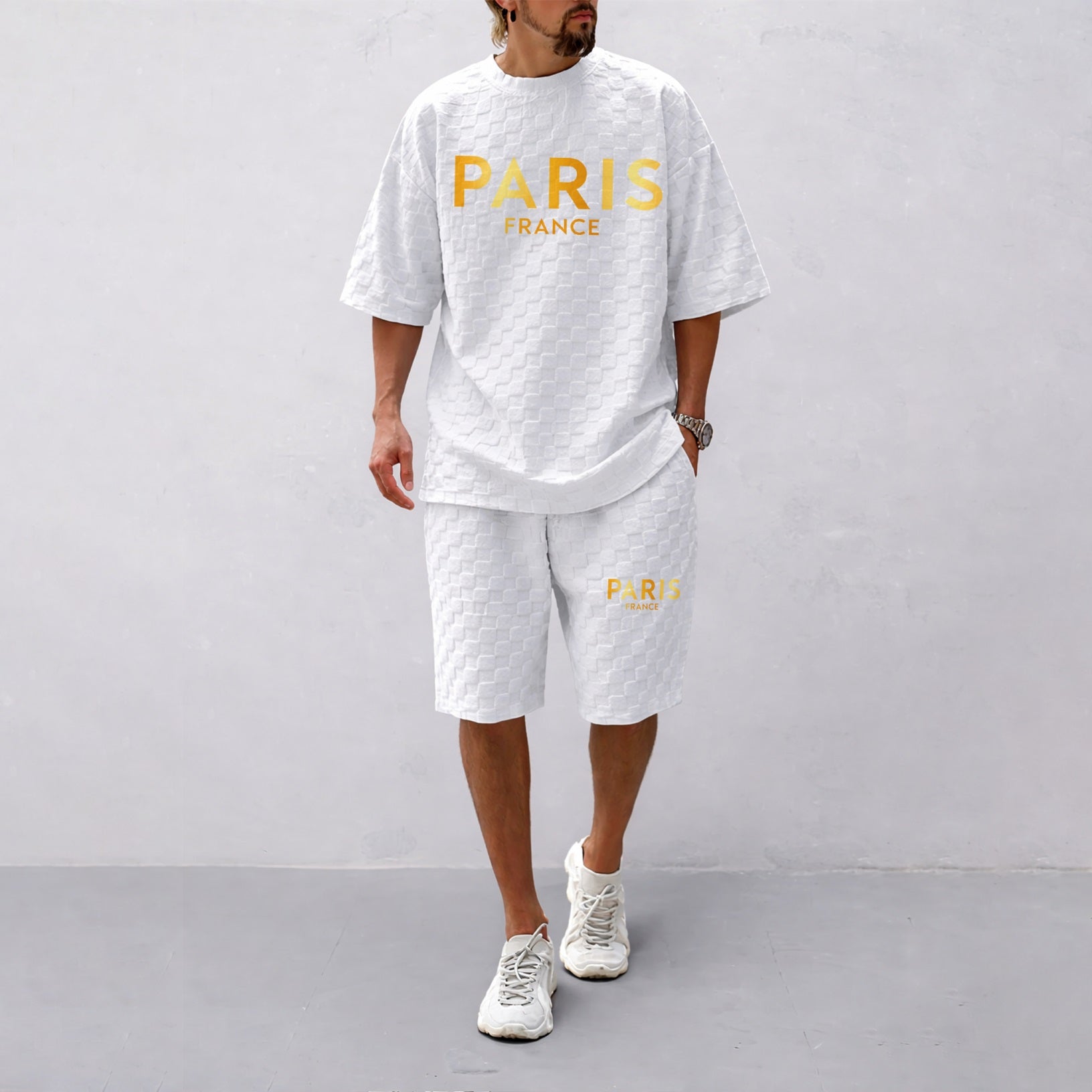 Men's Spring/Summer Drawstring Shorts Set featuring Paris Letter Print and Plaid Fabric—a casual summer ensemble comprising a short-sleeve shirt and shorts, ideal for both everyday wear and athletic activities.