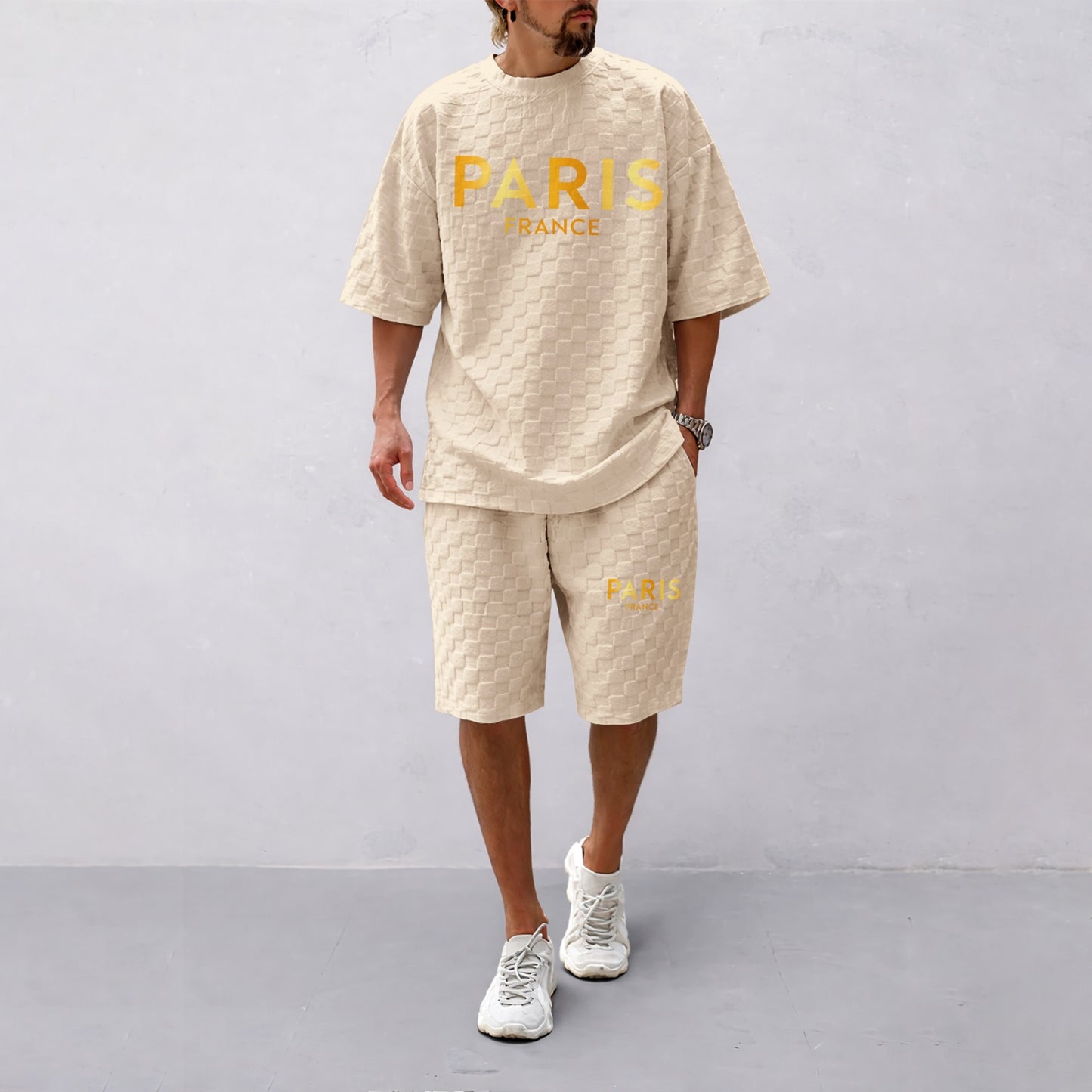 Men's Spring/Summer Drawstring Shorts Set featuring Paris Letter Print and Plaid Fabric—a casual summer ensemble comprising a short-sleeve shirt and shorts, ideal for both everyday wear and athletic activities.