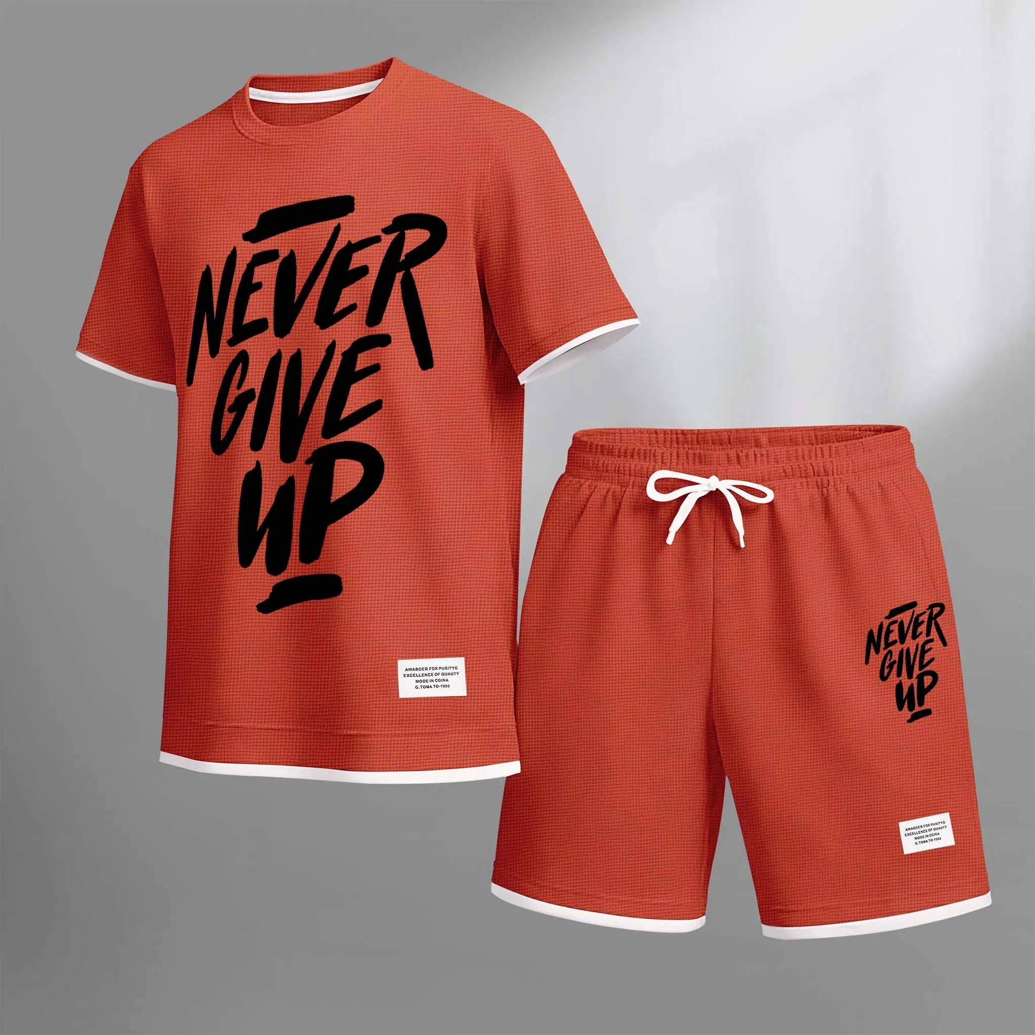 Men's Never Give Up Print Drawstring Shorts Set For Spring/Summer. A Casual Summer Outfit, Including A Short-Sleeved Shirt And Shorts, Suitable For Everyday Wear And Sports. A Two-Piece Set For A Relaxed And Energetic Lifestyle.