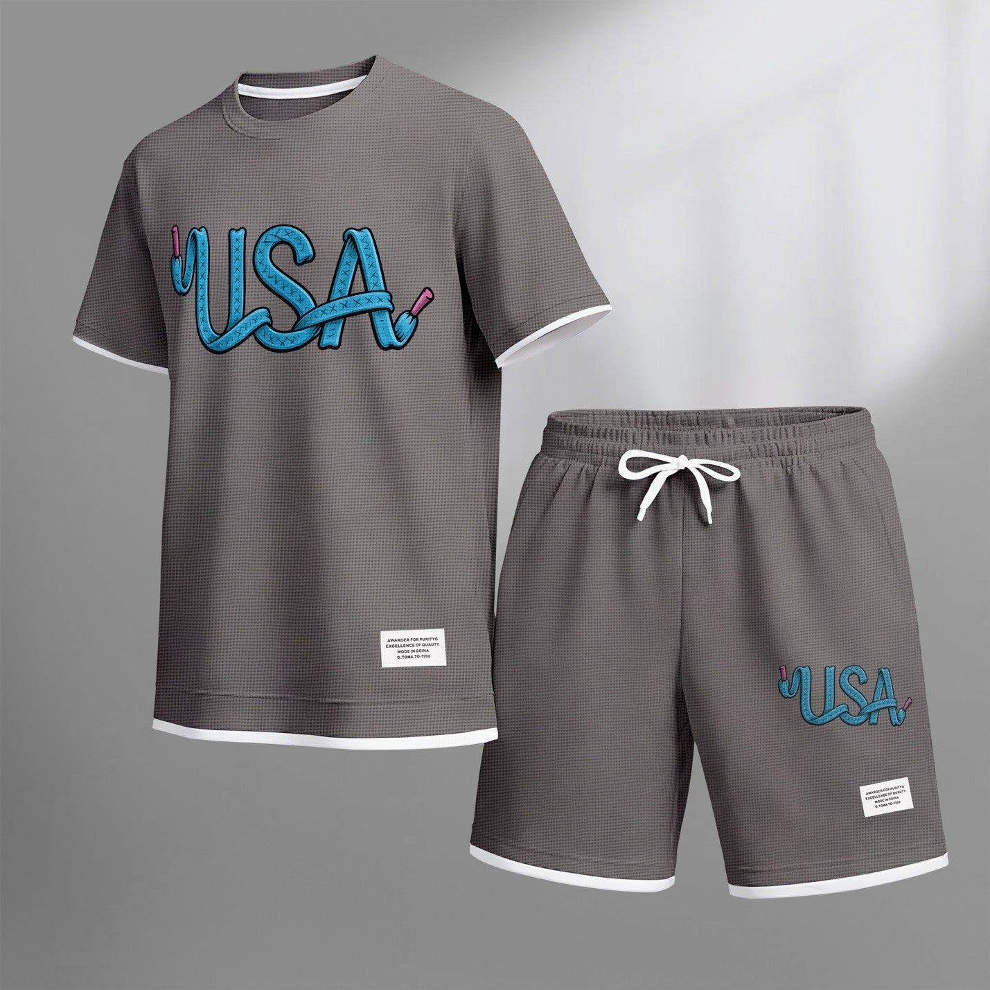 Men's USA print drawstring shorts set for spring/summer, a casual summer outfit including a short-sleeved shirt and shorts, suitable for everyday wear and sports. A two-piece set for a relaxed and energetic lifestyle.