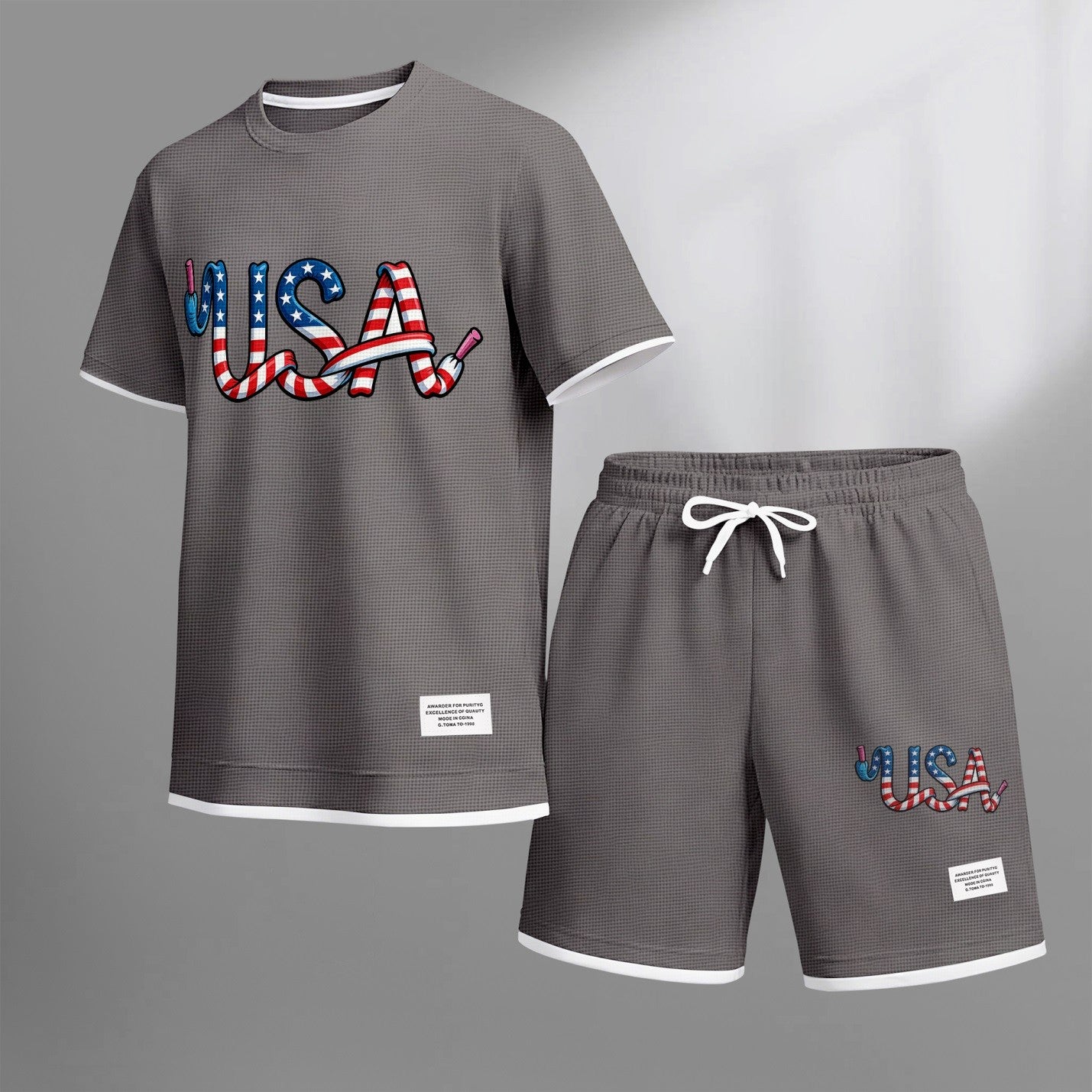 Men's USA print drawstring shorts set for spring/summer, a casual summer outfit including a short-sleeved shirt and shorts, suitable for everyday wear and sports. A two-piece set for a relaxed and energetic lifestyle.