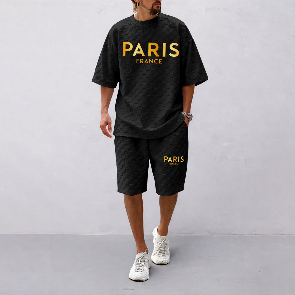 Men's Spring/Summer Drawstring Shorts Set featuring Paris Letter Print and Plaid Fabric—a casual summer ensemble comprising a short-sleeve shirt and shorts, ideal for both everyday wear and athletic activities.