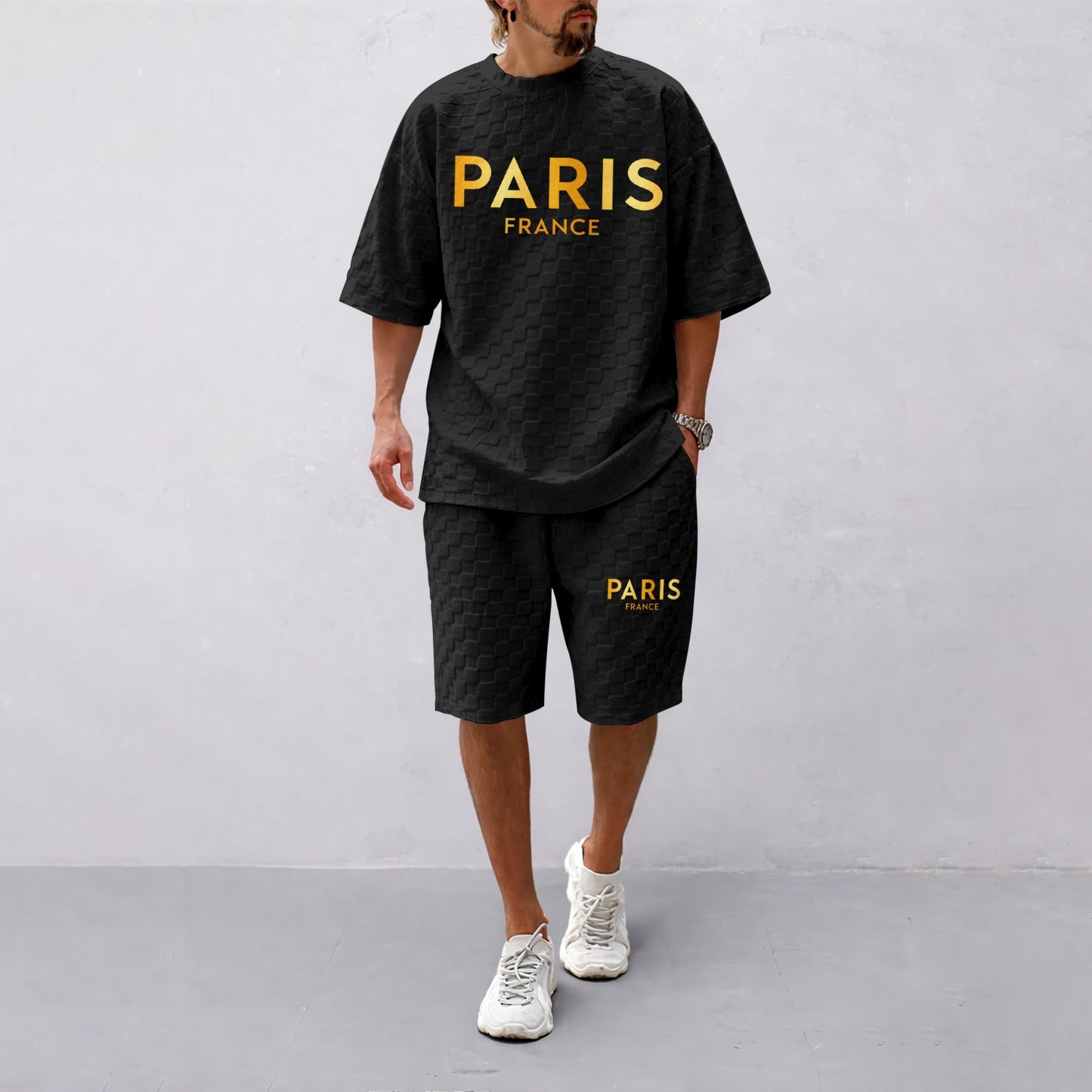 Men's Spring/Summer Drawstring Shorts Set featuring Paris Letter Print and Plaid Fabric—a casual summer ensemble comprising a short-sleeve shirt and shorts, ideal for both everyday wear and athletic activities.