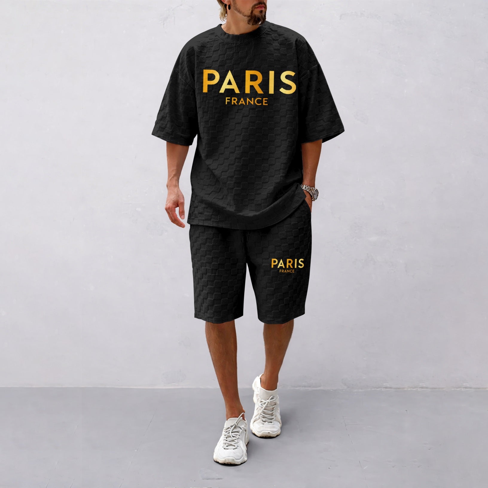 Men's Spring/Summer Drawstring Shorts Set featuring Paris Letter Print and Plaid Fabric—a casual summer ensemble comprising a short-sleeve shirt and shorts, ideal for both everyday wear and athletic activities.