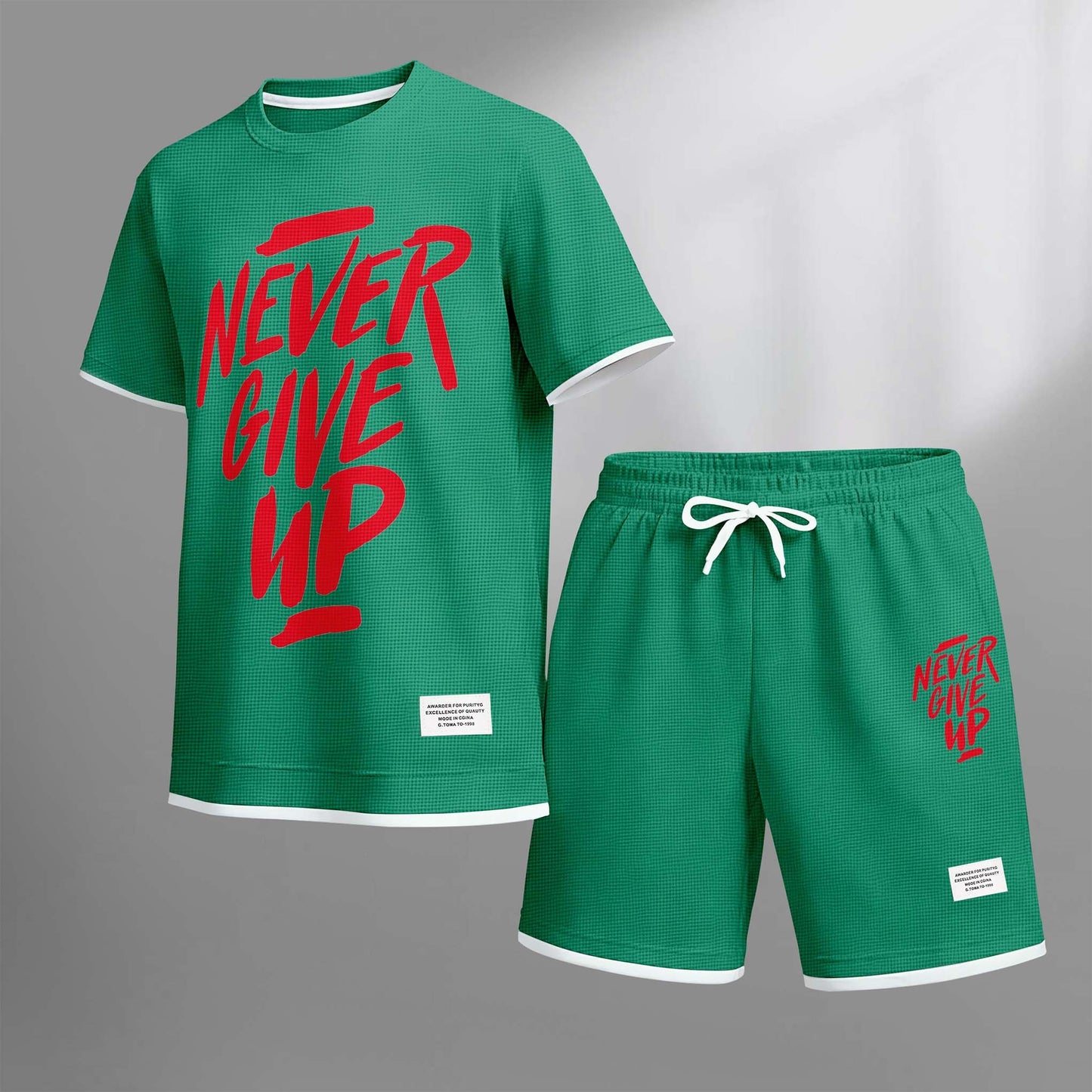 Men's Never Give Up Print Drawstring Shorts Set For Spring/Summer. A Casual Summer Outfit, Including A Short-Sleeved Shirt And Shorts, Suitable For Everyday Wear And Sports. A Two-Piece Set For A Relaxed And Energetic Lifestyle.